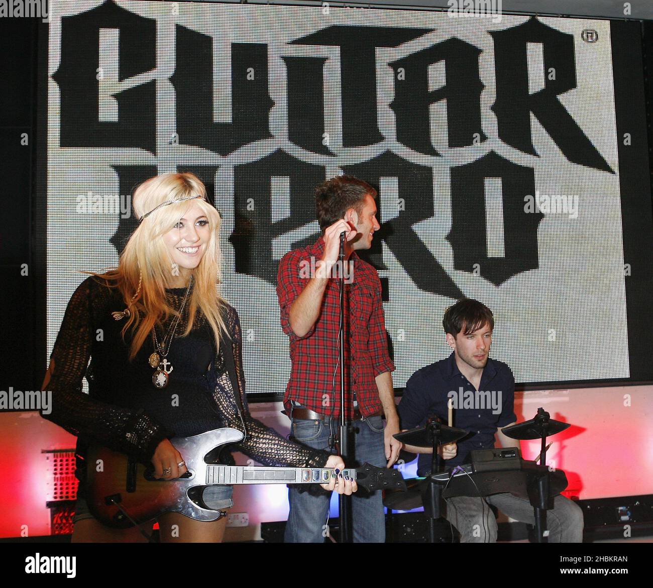 Pixie Lott launches the latest instalment of music making game, Guitar Hero at HMV Oxford Street in central London. Stock Photo