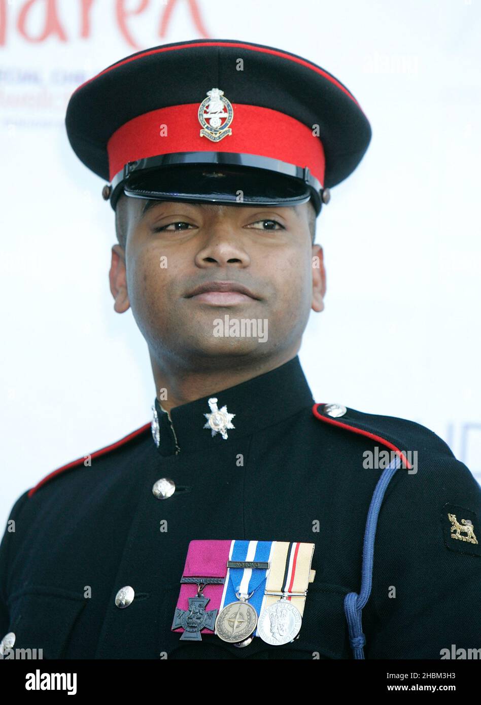 Lance Corporal Johnson Beharry VC arrives at the Caudwell Children Buterfly Ball at Battersea Evolution, London. Stock Photo