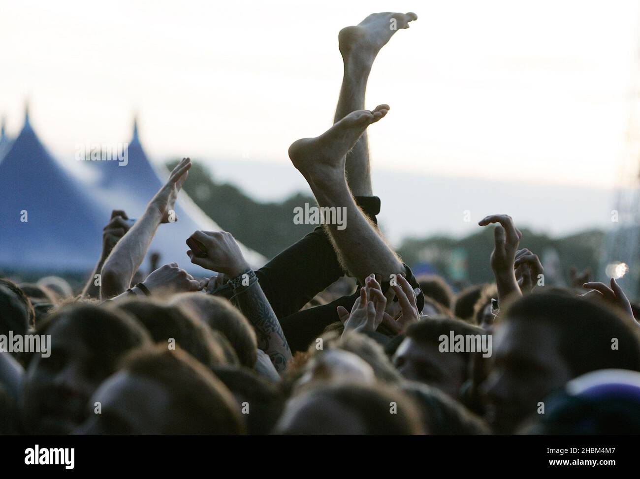 Crowd surfing during day 3 at the 2010 Download Festival in Castle Donnington, Leicestershire. Stock Photo
