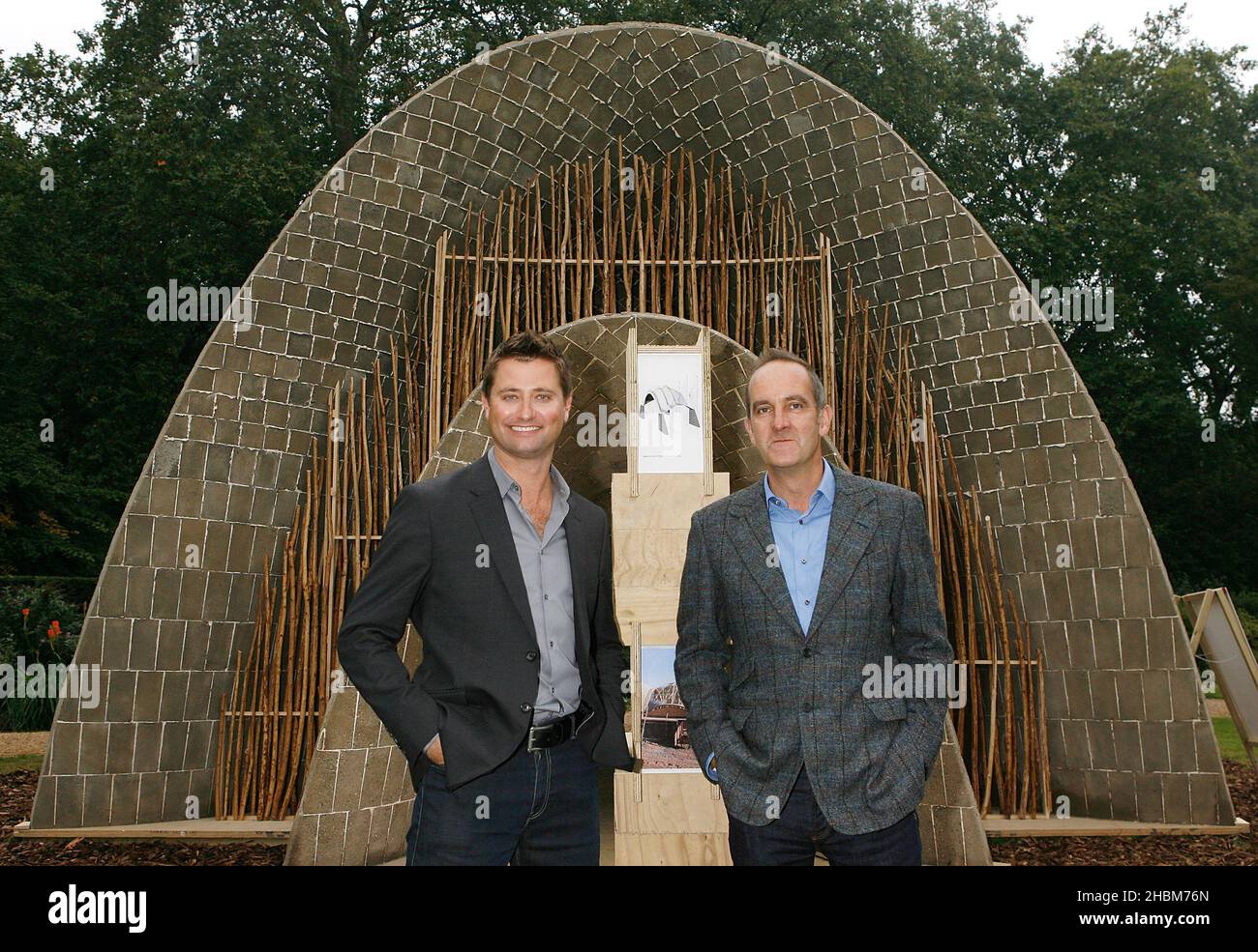 Kevin McCloud (right) and George Clarke left at the 'A Garden Party to Make a Difference' at Clarence House, Gardens, London. Stock Photo