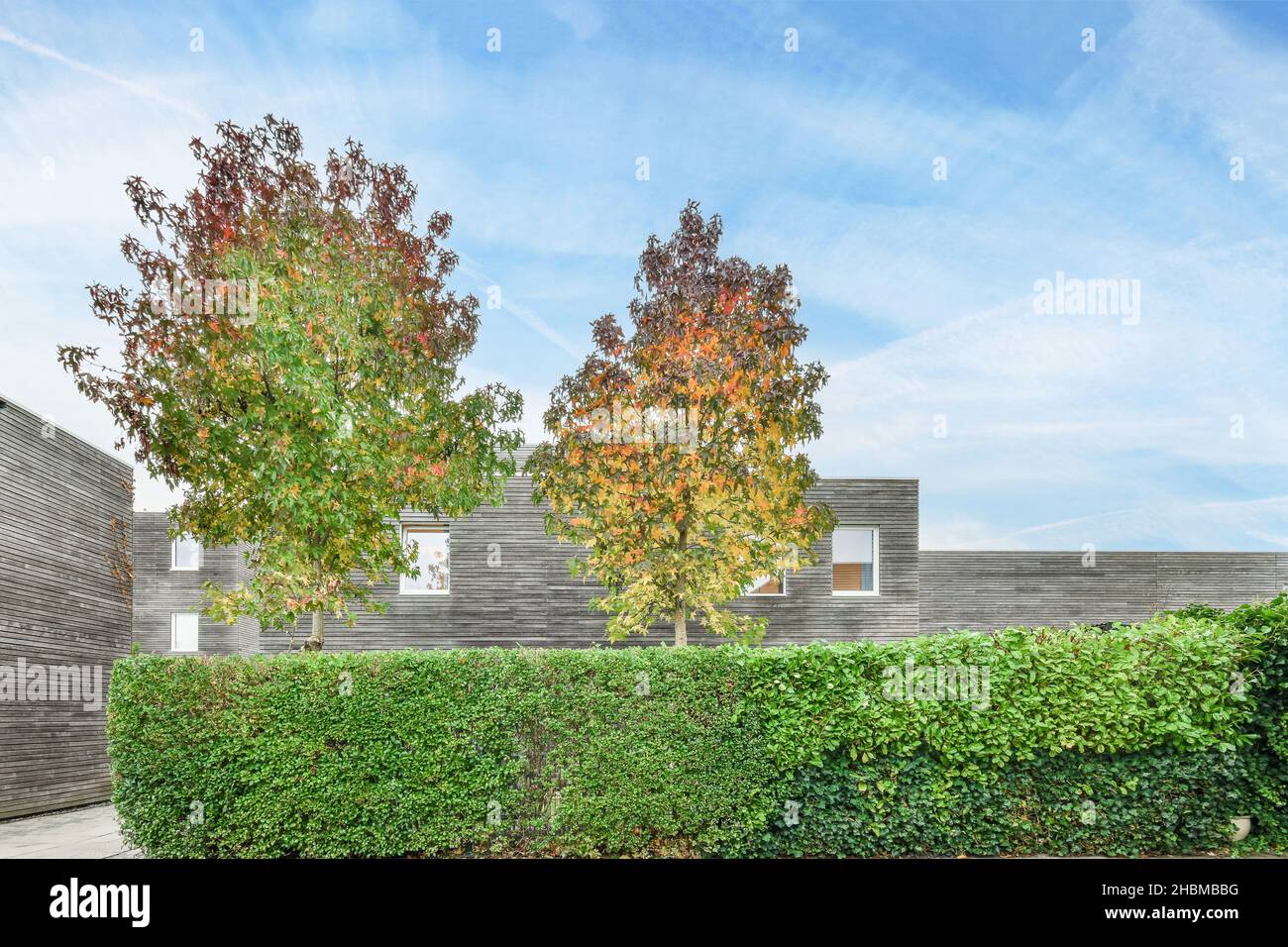 View of newly constructed modern house facade Stock Photo - Alamy