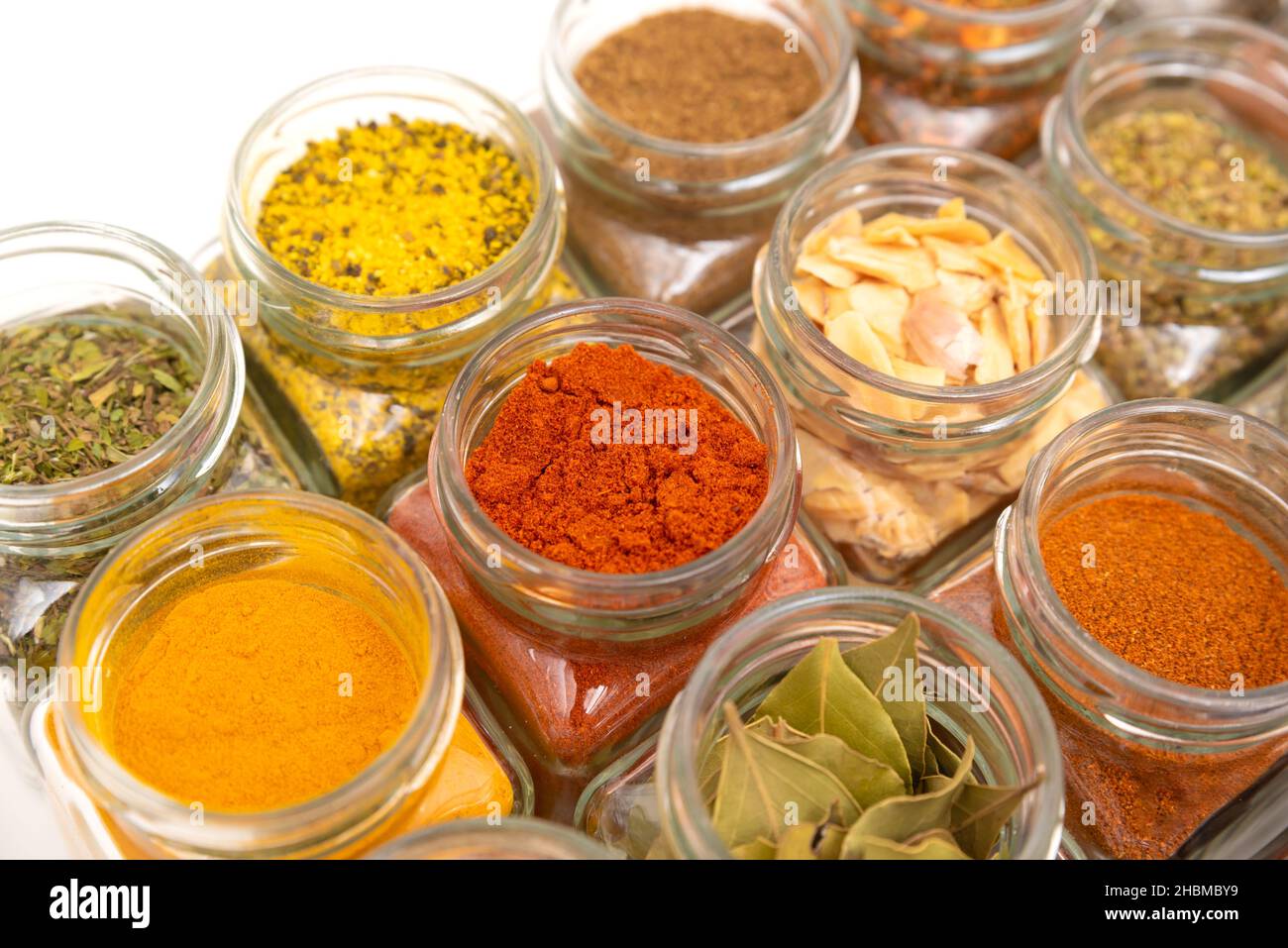 Spice jars, spice background. Various spices used in the kitchen Stock