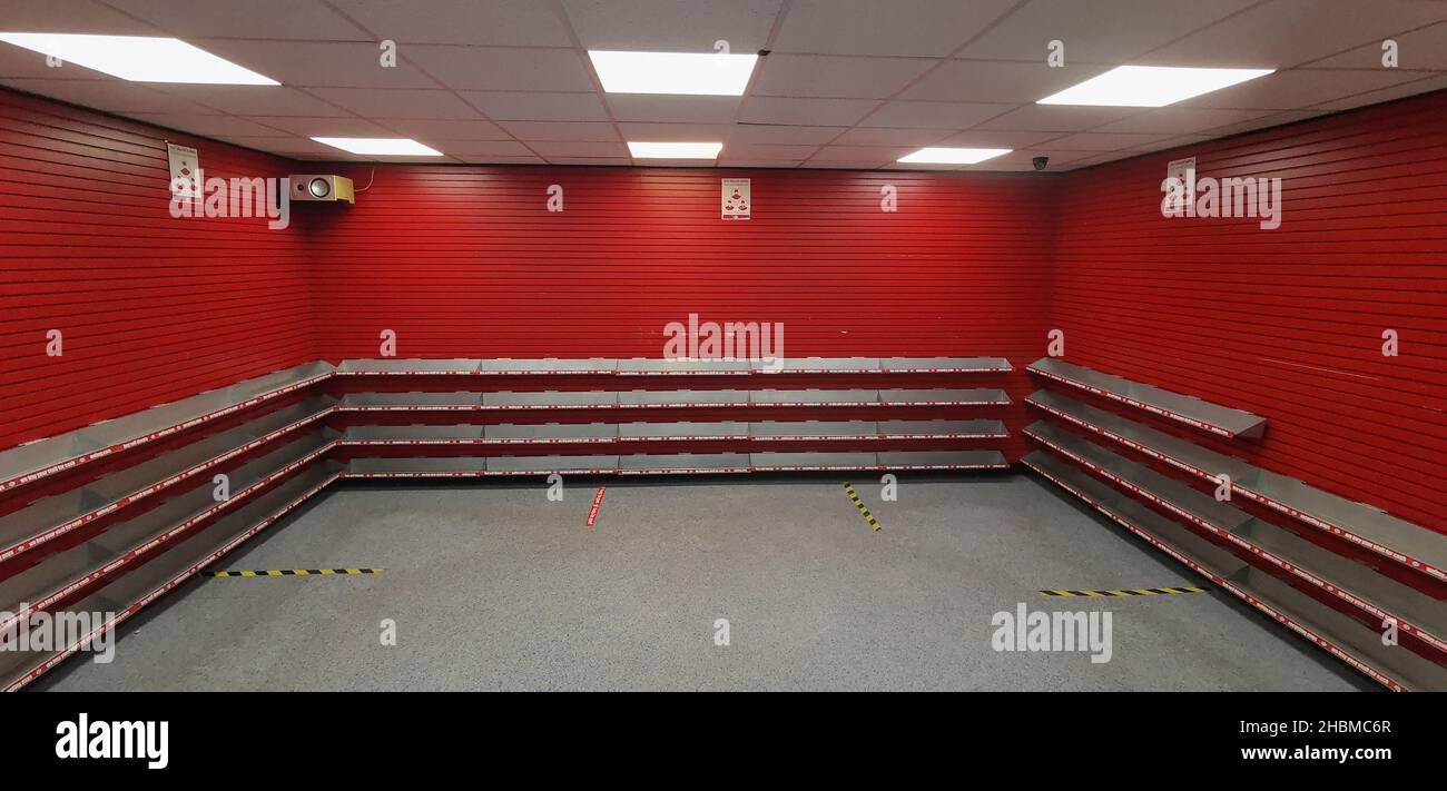 Empty shelves at CeX Ltd. A second hand goods chain based in the United Kingdom specialising in technology, computing, video games, DVDs and technology Stock Photo