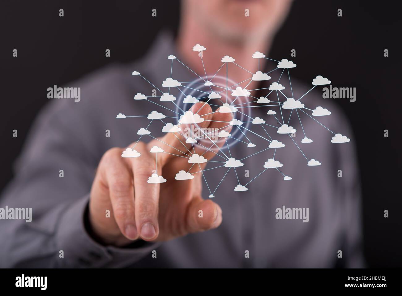 Man touching a cloud network on a touch screen with his finger Stock ...