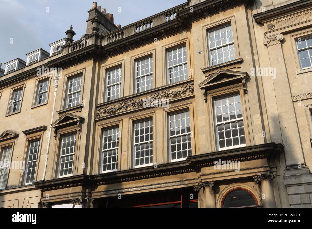 The ornate upper exterior frontage of the Octagon chapel on Milsom street in Bath England UK. Ted Baker shop. Georgian architecture Stock Photo