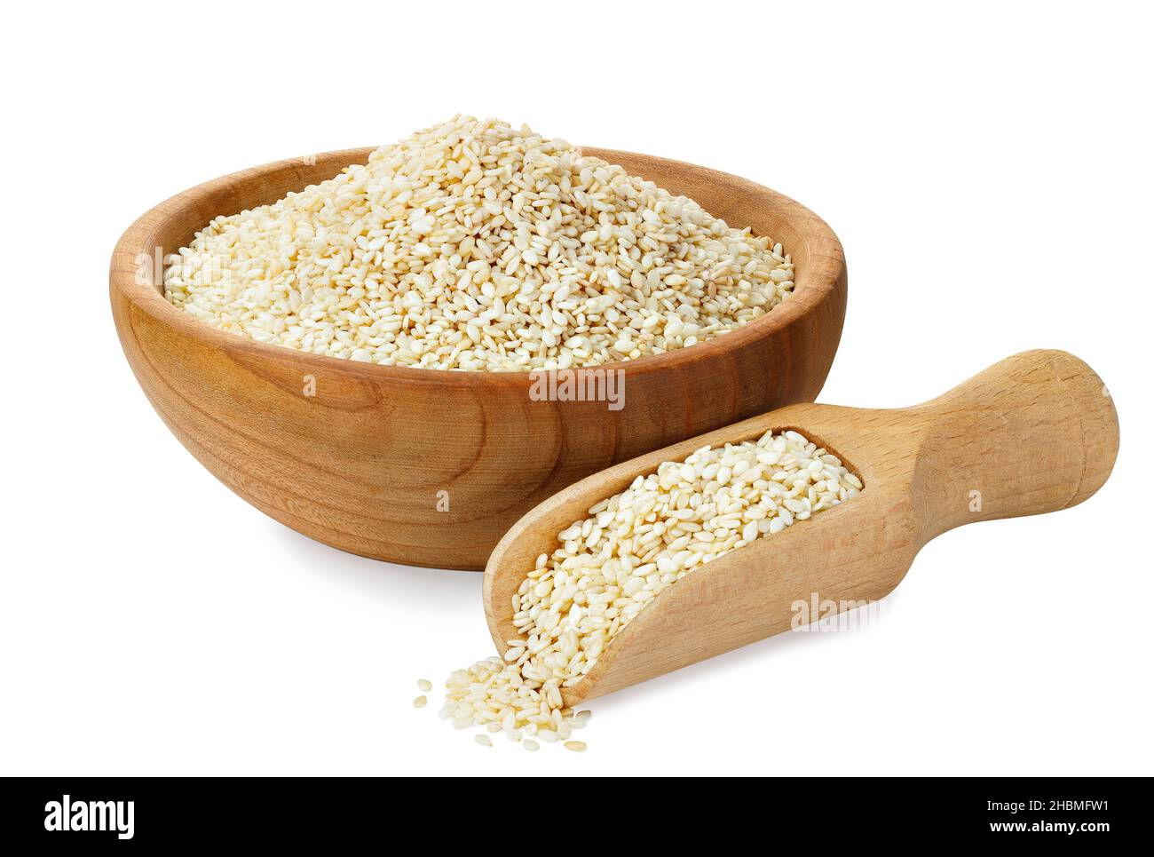 sesame seeds in wooden bowl and scoop isolated Stock Photo - Alamy