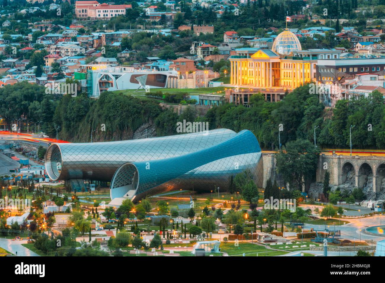 Concert Hall In Shape Of Two Metal Glass Tubes, HiTech Style In Evening Rike Park, Tbilisi