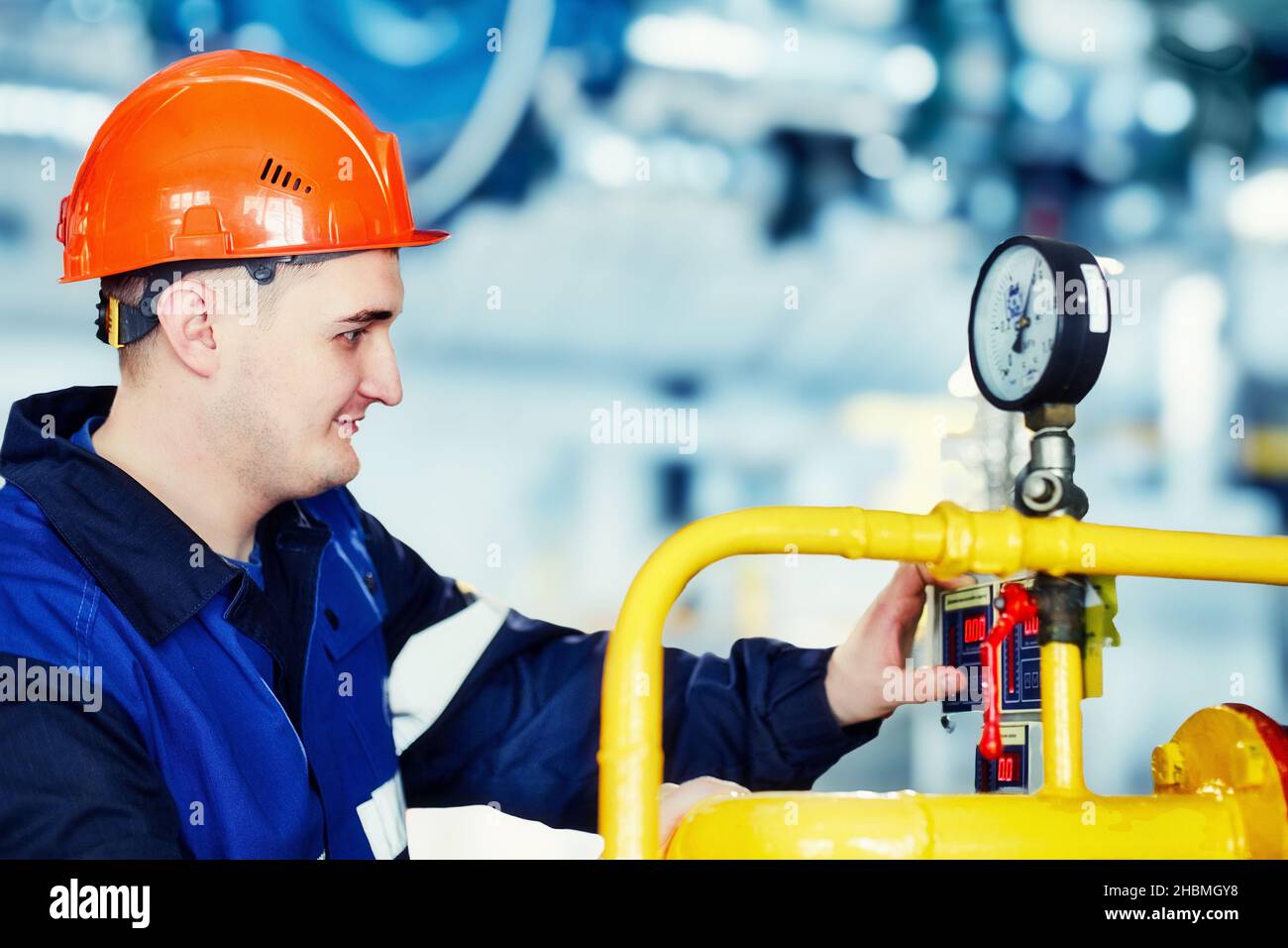 Man in boiler room working hi-res stock photography and images - Alamy