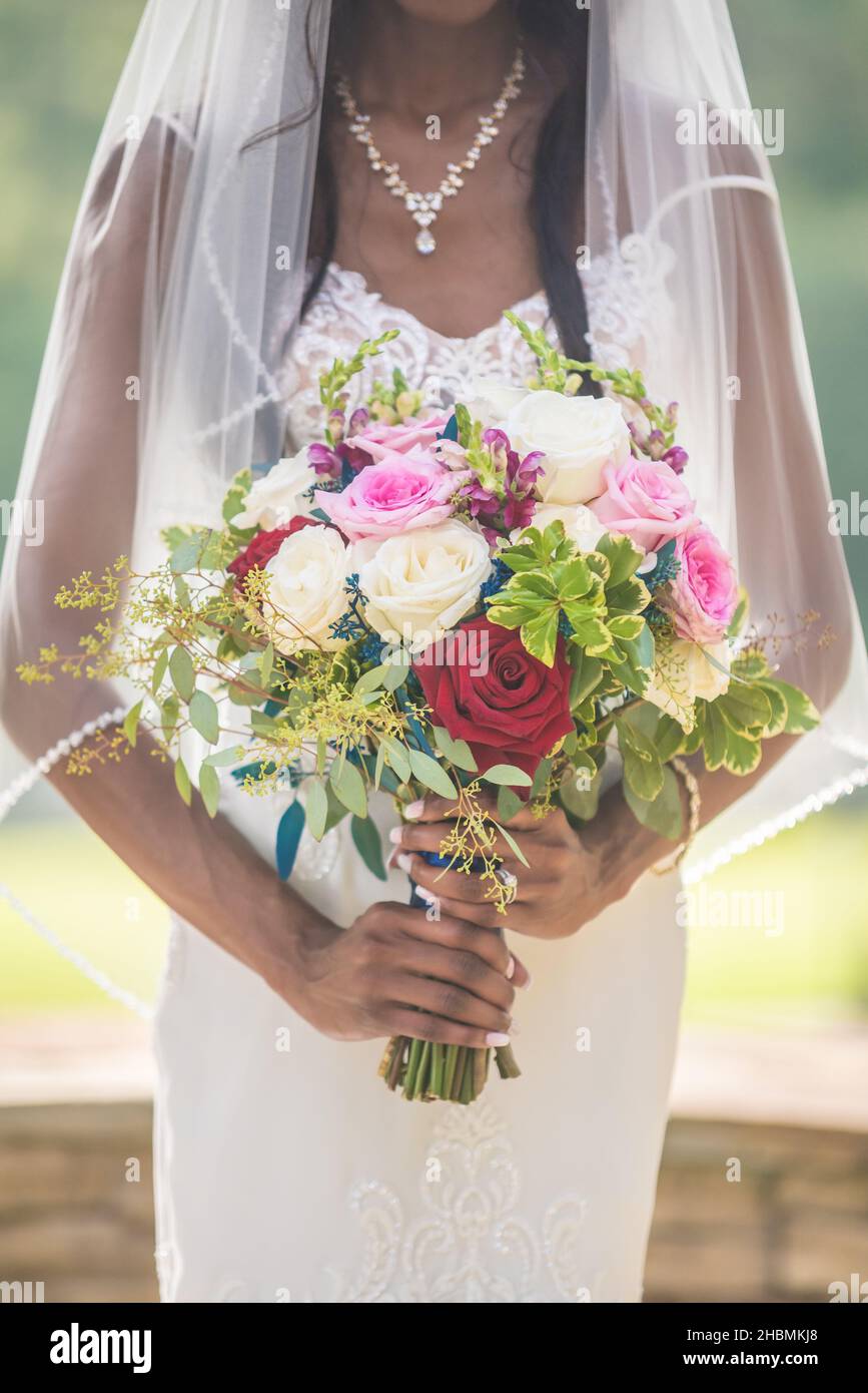 African bride holding bouquet hi-res stock photography and images - Alamy
