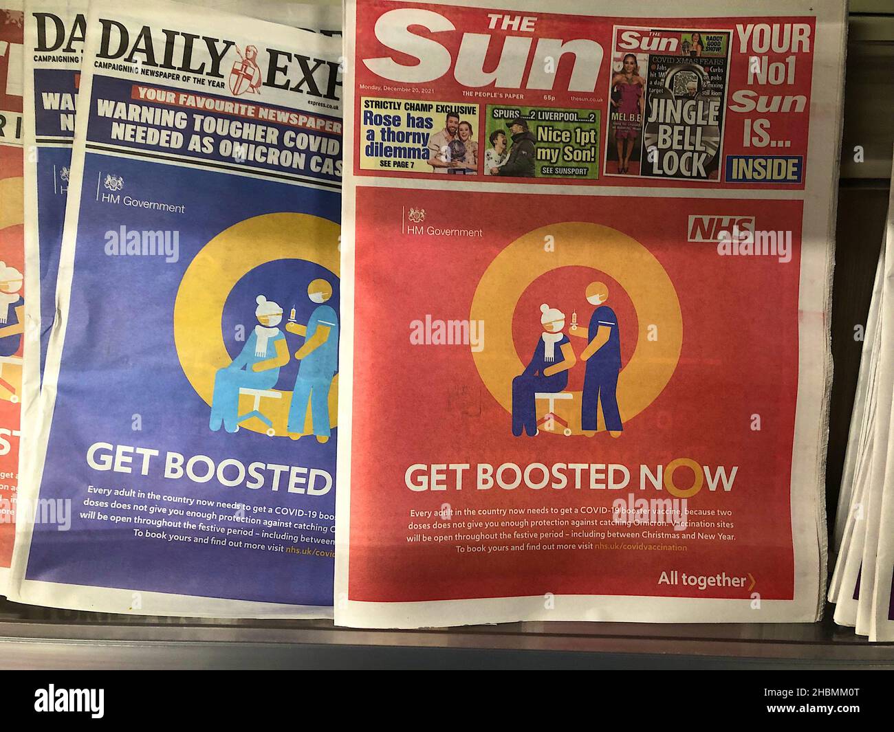Ashford, Kent, UK. 20th Dec, 2021. Covid Booster campaign on the front page of all uk national newspapers on display. Get boosted now. Photo Credit: Paul Lawrenson /Alamy Live News Stock Photo