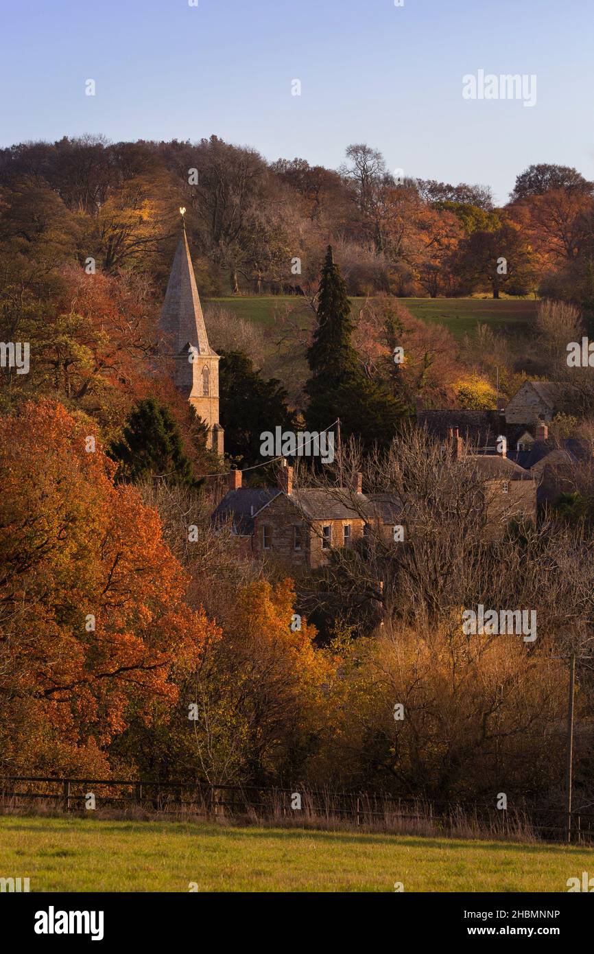 Swerford village and church in autumn colours,Cotswolds,oxfordshire,England Stock Photo