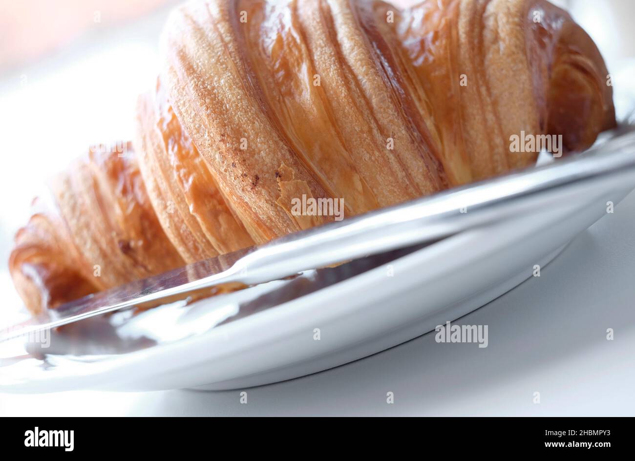 luxury croissant on white plate Stock Photo