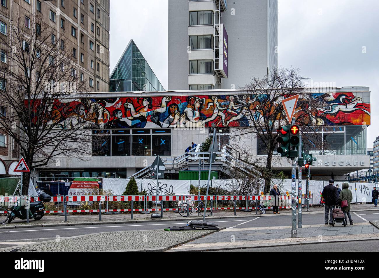 The Press cafe and newly exposed East German mural by Artist Willi
