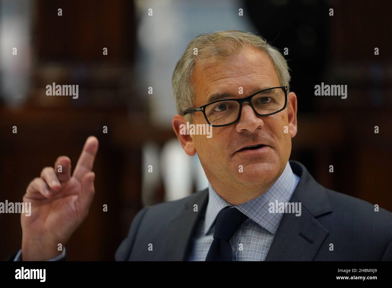 Bruce Carnegie-Brown Chairman of Lloyd's speaks in front of the Lutine ...