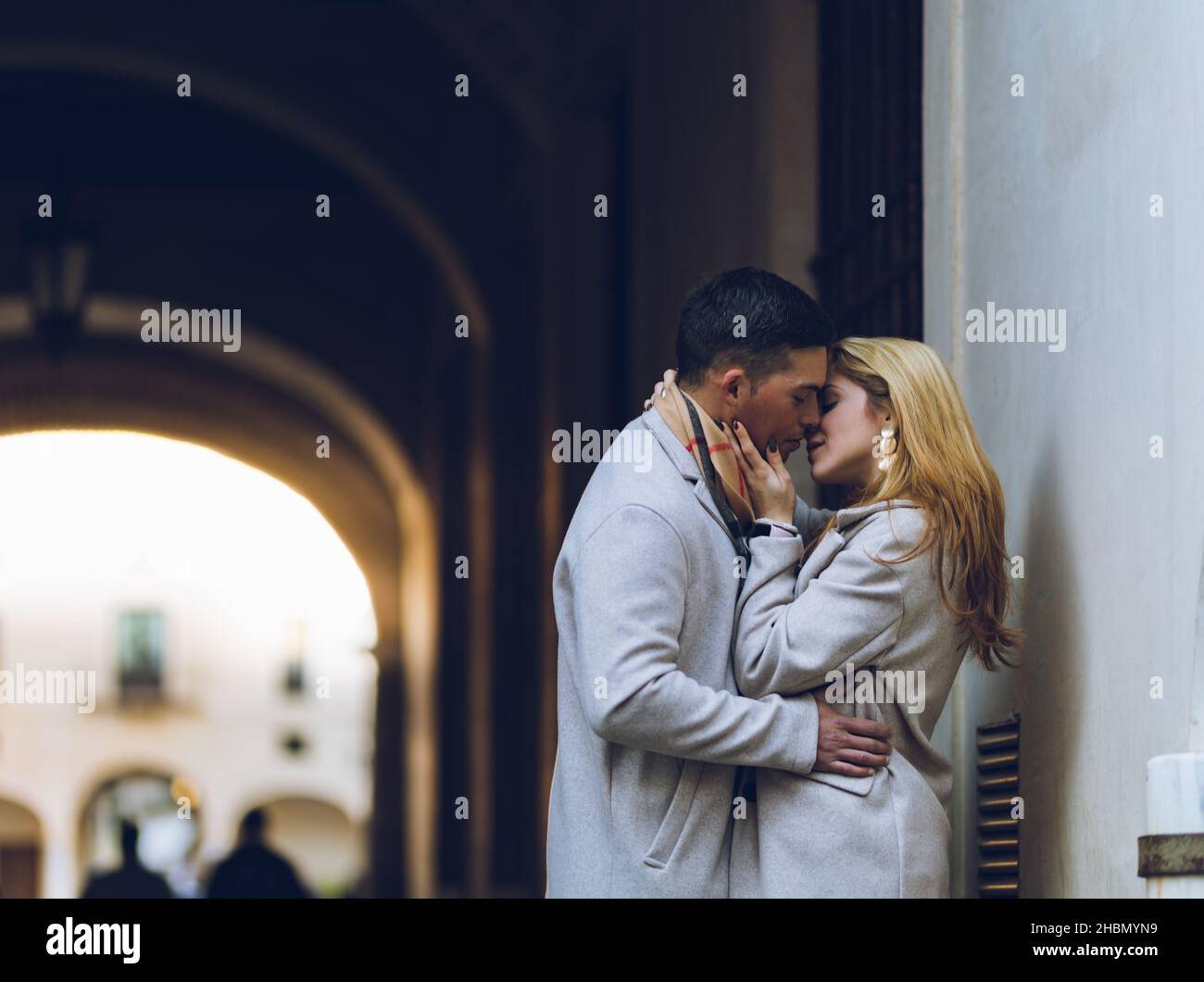Young couple in love kissing on the street Stock Photo