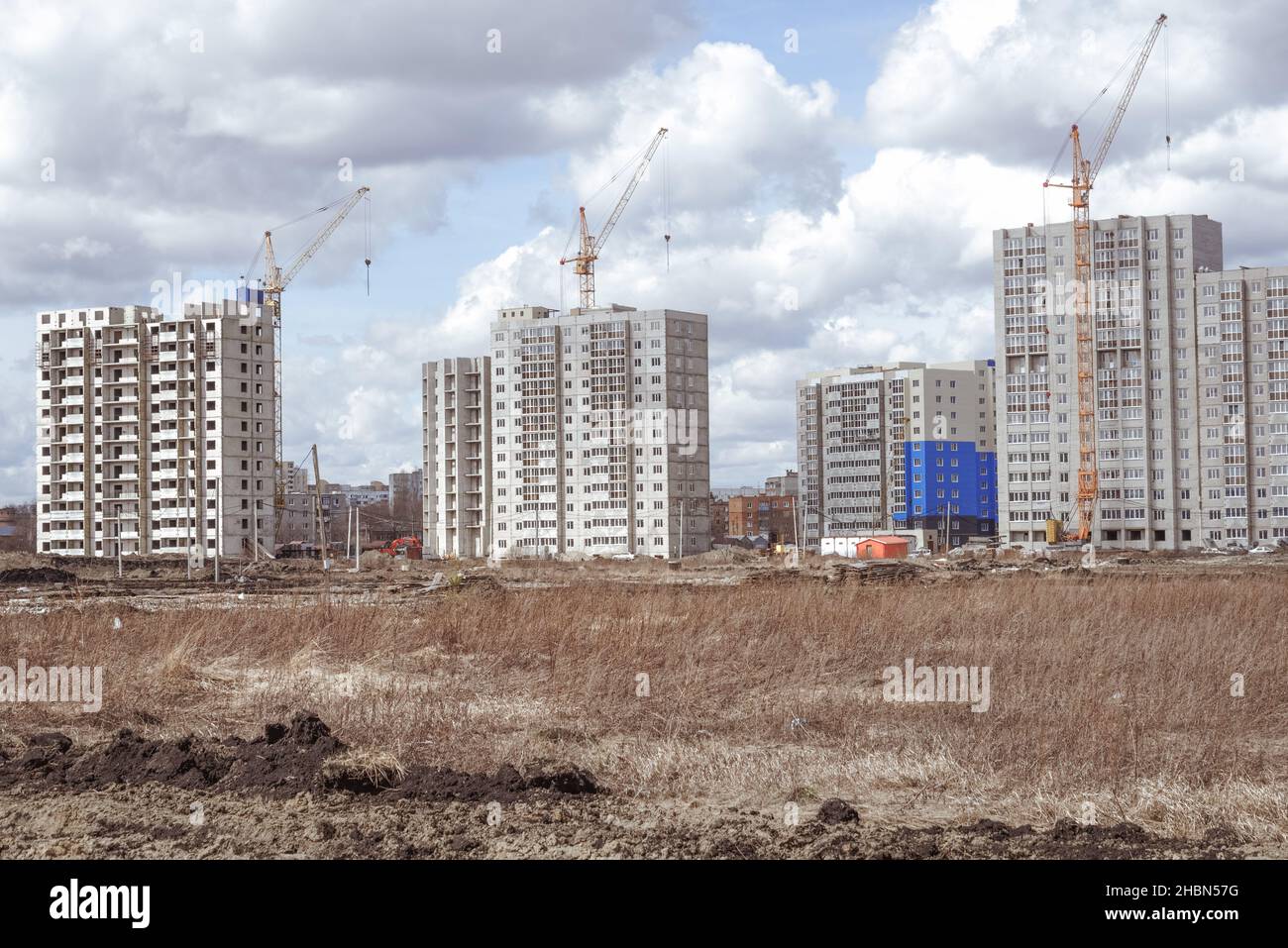 New residential development and high crane Stock Photo