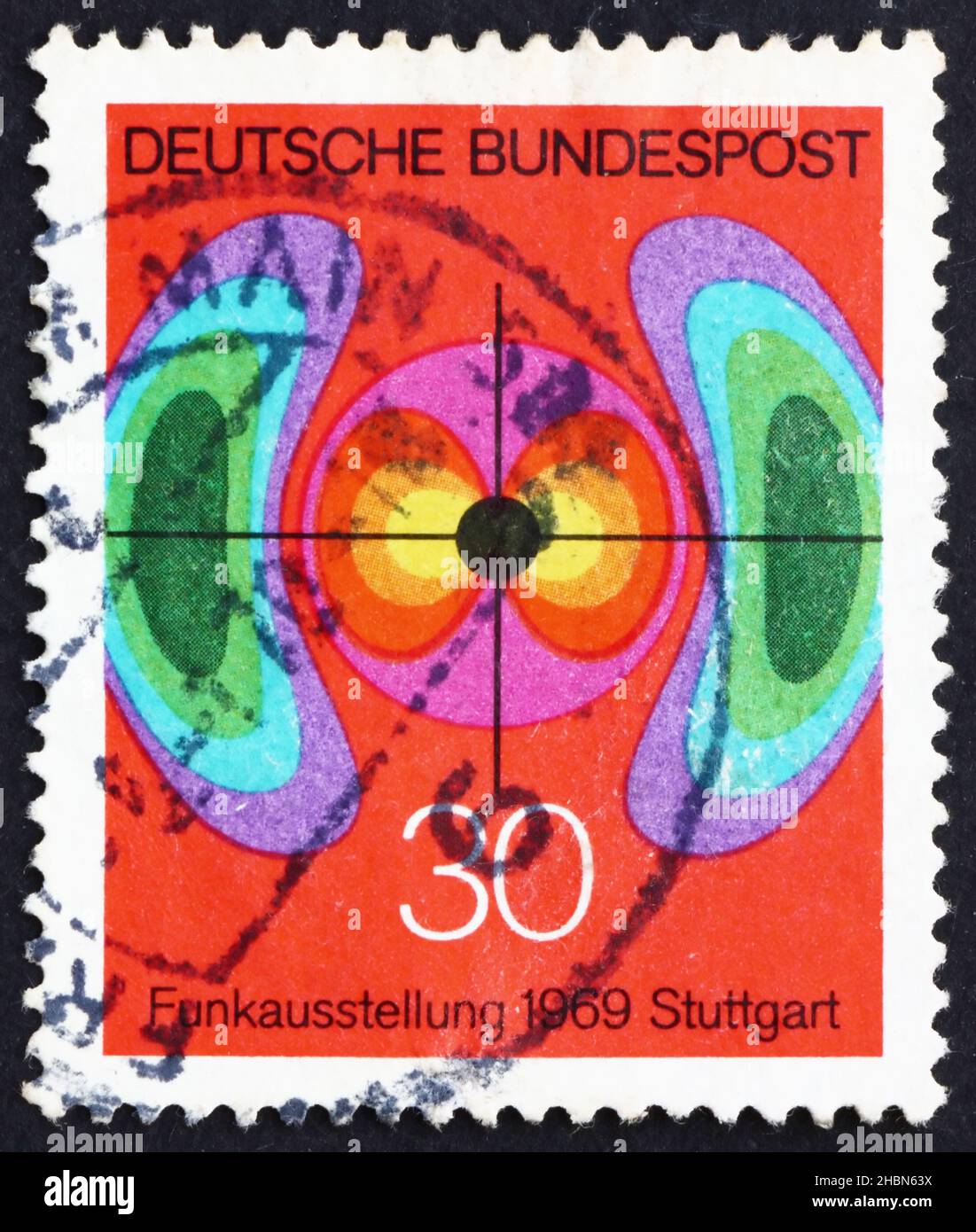 GERMANY - CIRCA 1969: a stamp printed in the Germany shows Diagram of Electromagnetic Field, German Radio Exhibition, Stuttgart, circa 1969 Stock Photo