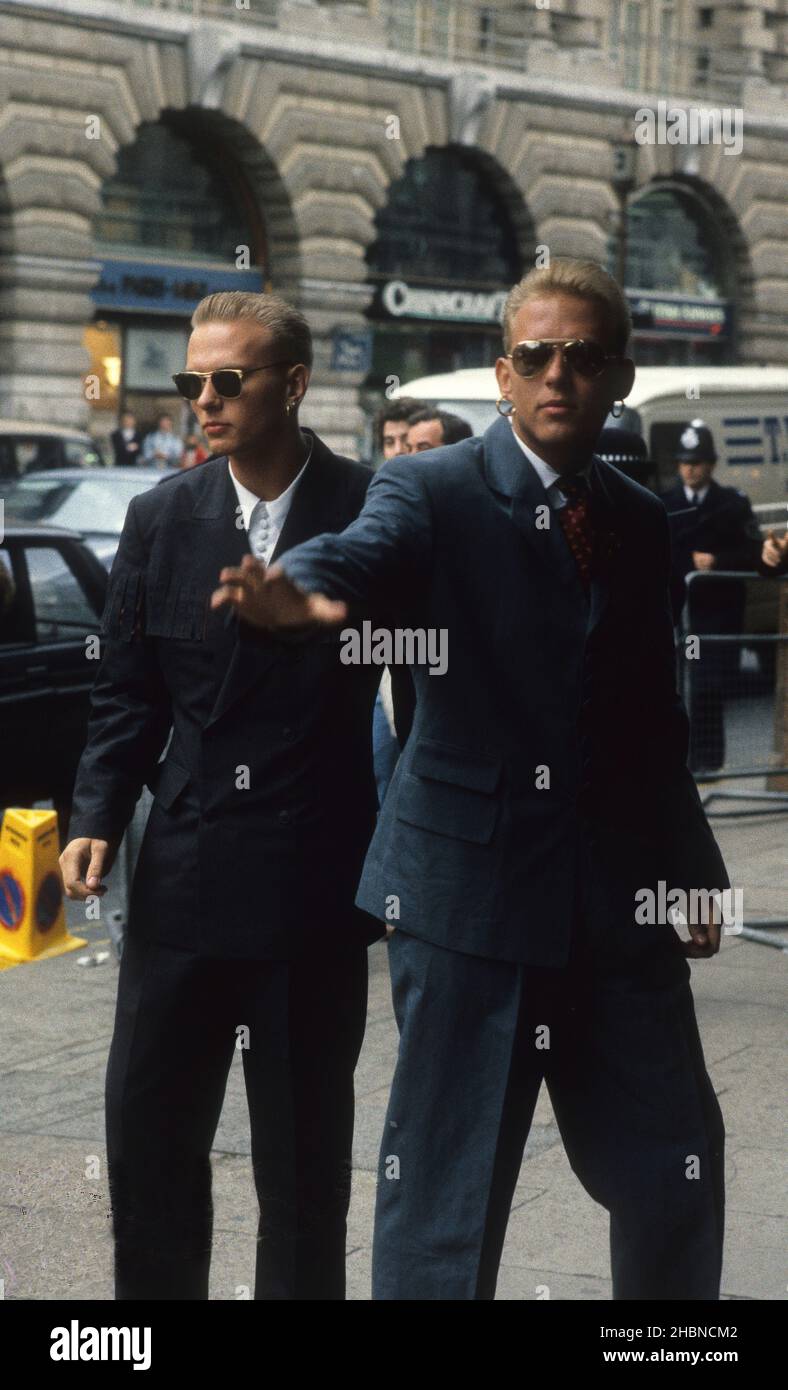 Bros twins Matt and Luke Goss arriving at the Cafe Royal 1989 Stock Photo