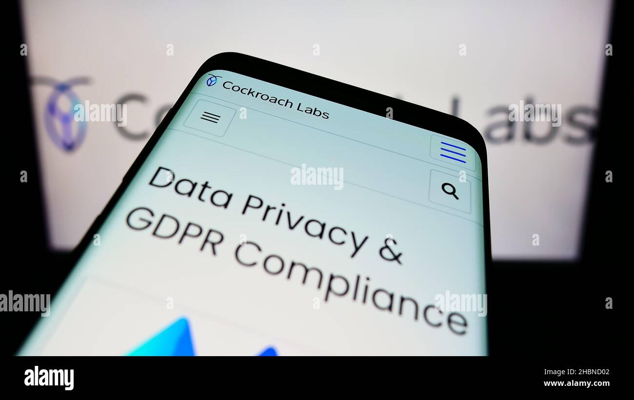 Mobile phone with website of American SQL database company Cockroach ...