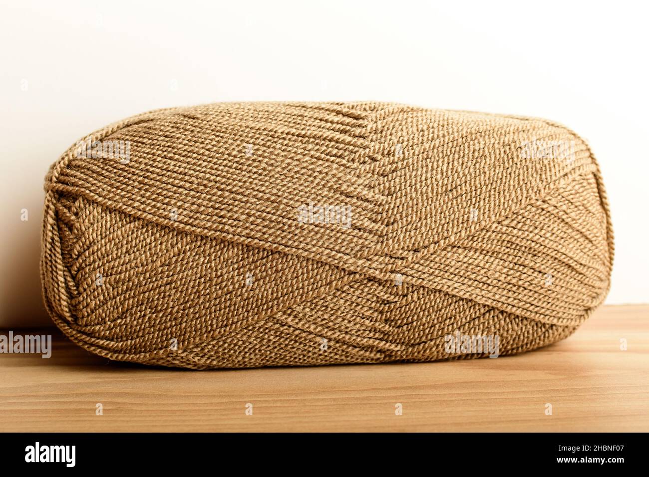 One light brown knitting wool threads for sewing or from embroidery ...