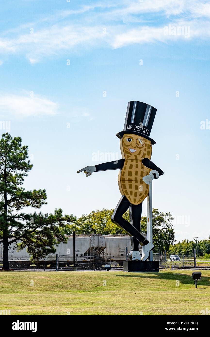 Fort Smith, AR -  Sept. 15, 2021: Giant Mr Peanut mascot stands outside in front of the Planters Peanut manufacturing plant. Stock Photo