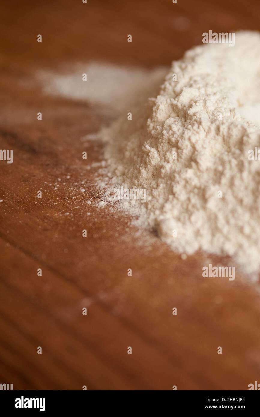 detail shot of wheat flour volcano on the flour counter Stock Photo Alamy