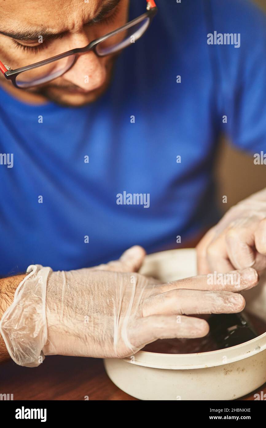 technician performing head cleaning and maintenance with swab Stock
