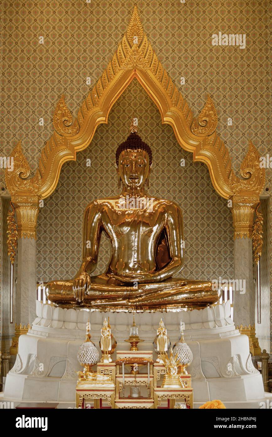 Golden statue of Buddha sitting in meditative pose, Bangkok, Thailand ...
