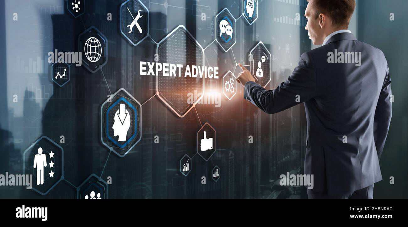 Expert advice. Businessman hand touching inscription on virtual screen. Stock Photo