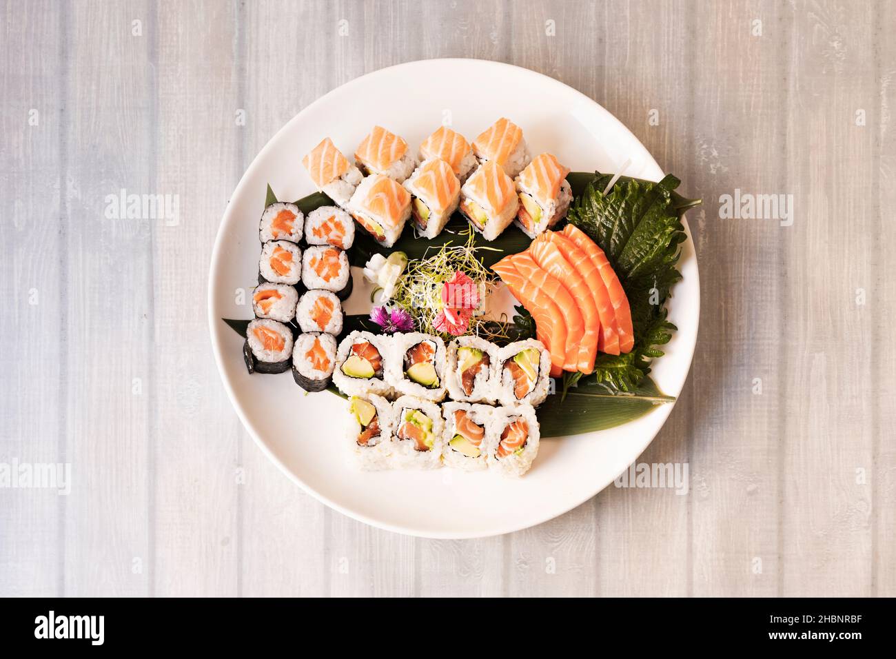 Sushi is a typical dish of Japanese origin based on rice seasoned with rice vinegar, sugar and