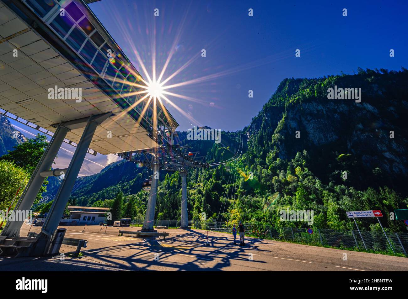 Rope Way View The beautiful view of a ropeway with a shining sun and mountains Stock ...