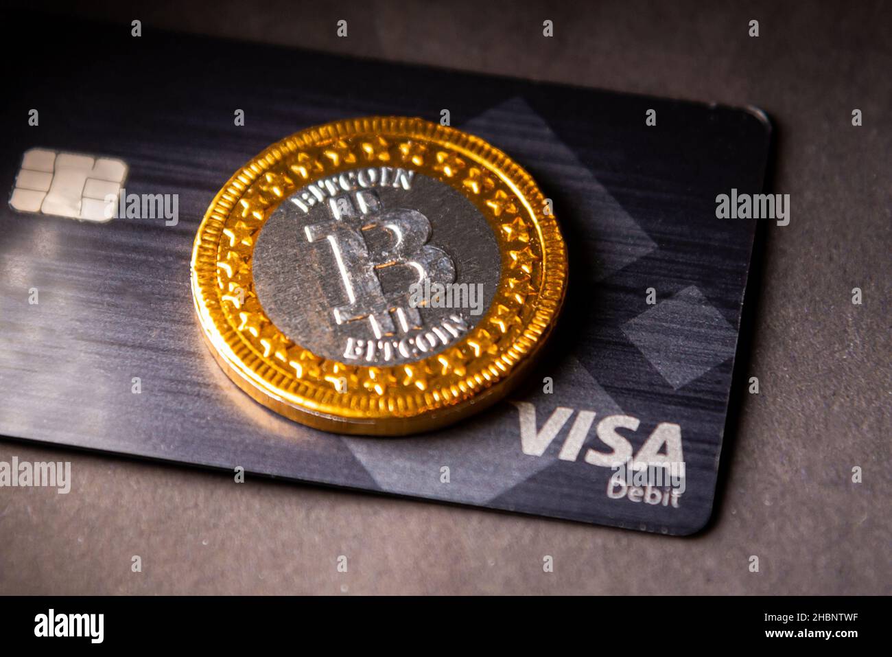 bitcoin cryptocurrency with Visa credit card. Visa - American multinational  company providing services of payment operations. Riga, Latvia - November  Stock Photo - Alamy
