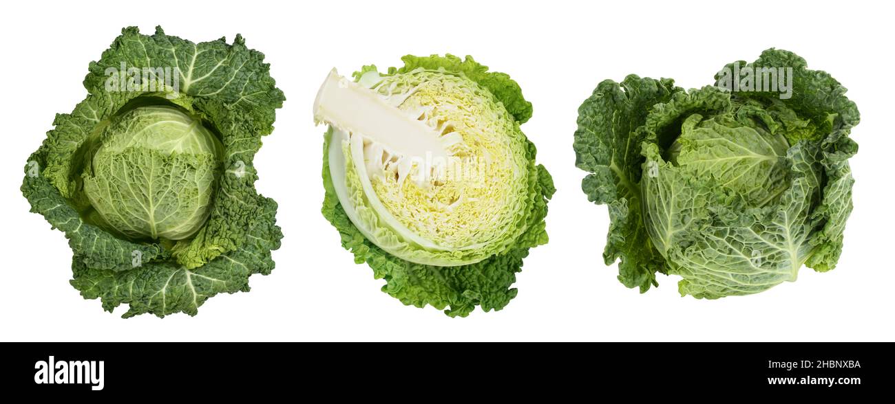 Savoy cabbage with half isolated on white background with full depth of ...