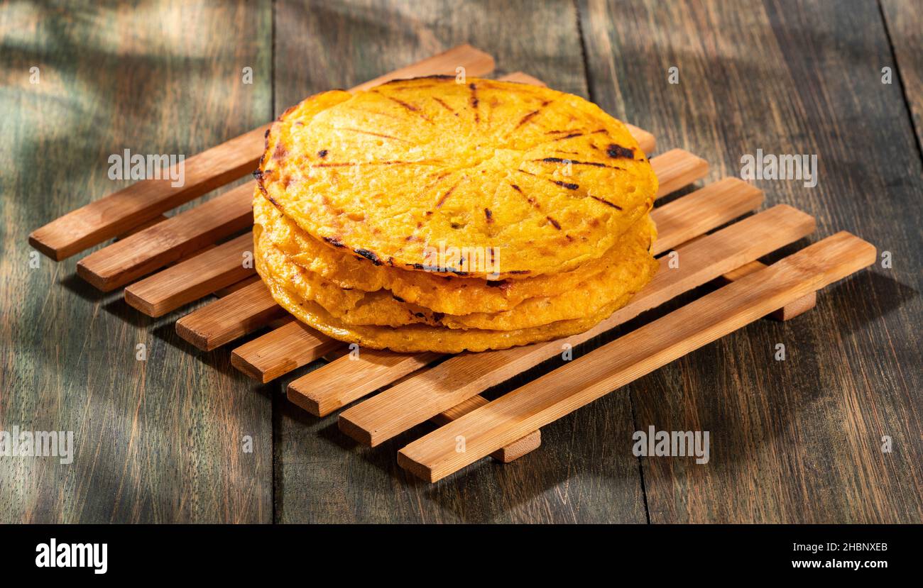 Arepa of ground corn - Traditional Colombian food Stock Photo - Alamy