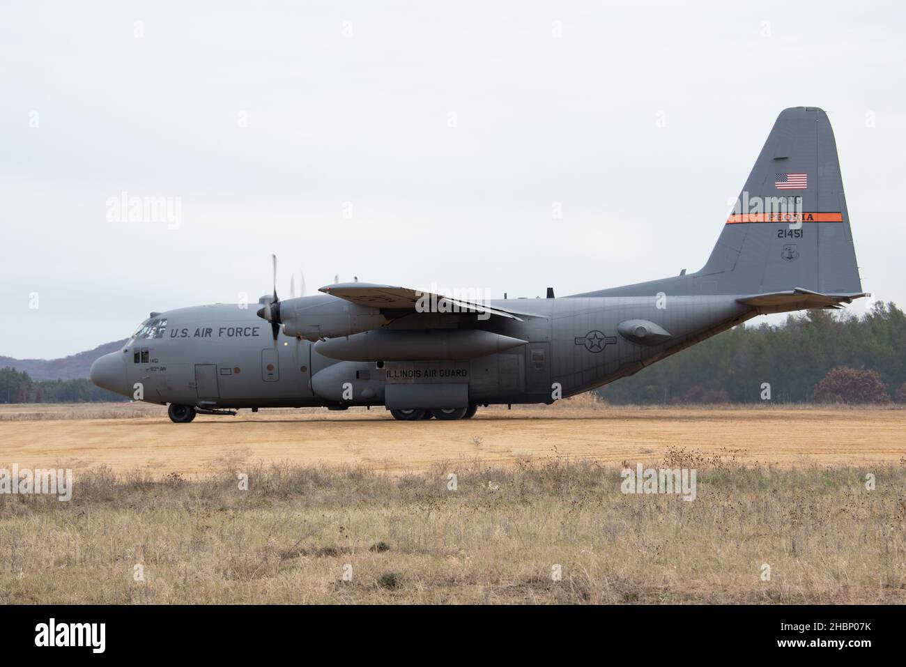 Member of the 182nd Airlift Wing with the Illinois Air National Guard landing C130 aircraft at Fort McCoy Young Air Assault Strip. The C130 were flown by crews from the 169th out of Peoria, IL. Stock Photo