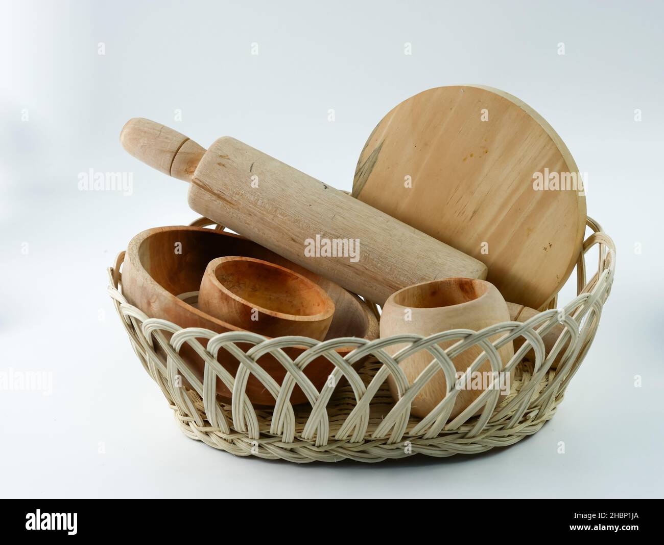 wooden kitchen utensils in bamboo basket Stock Photo Alamy