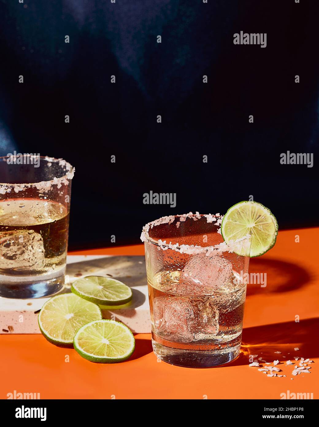 Tequila on ice with Salt Rim and Lime Stock Photo Alamy