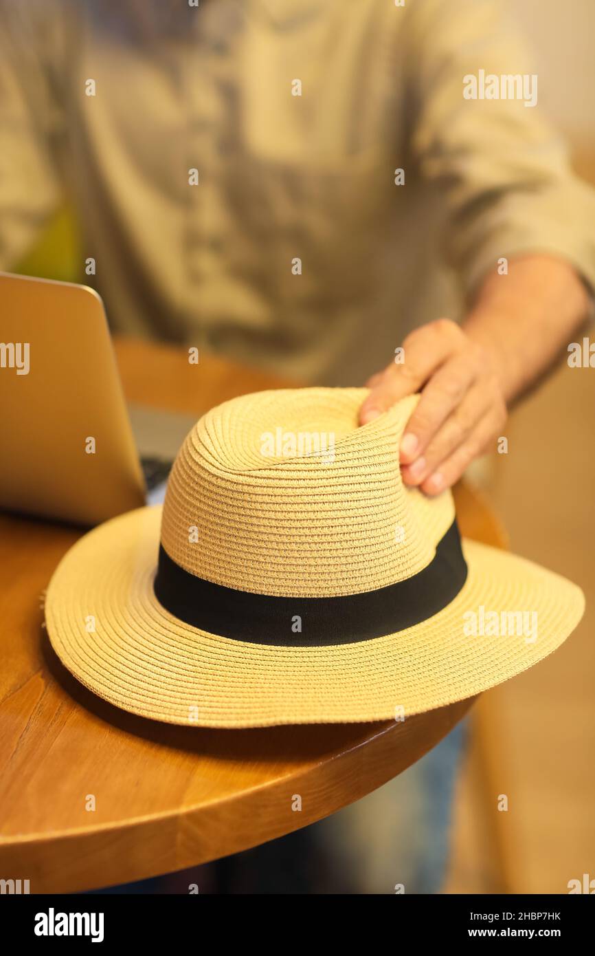 Man freelancer in hat sitting hi-res stock photography and images - Alamy