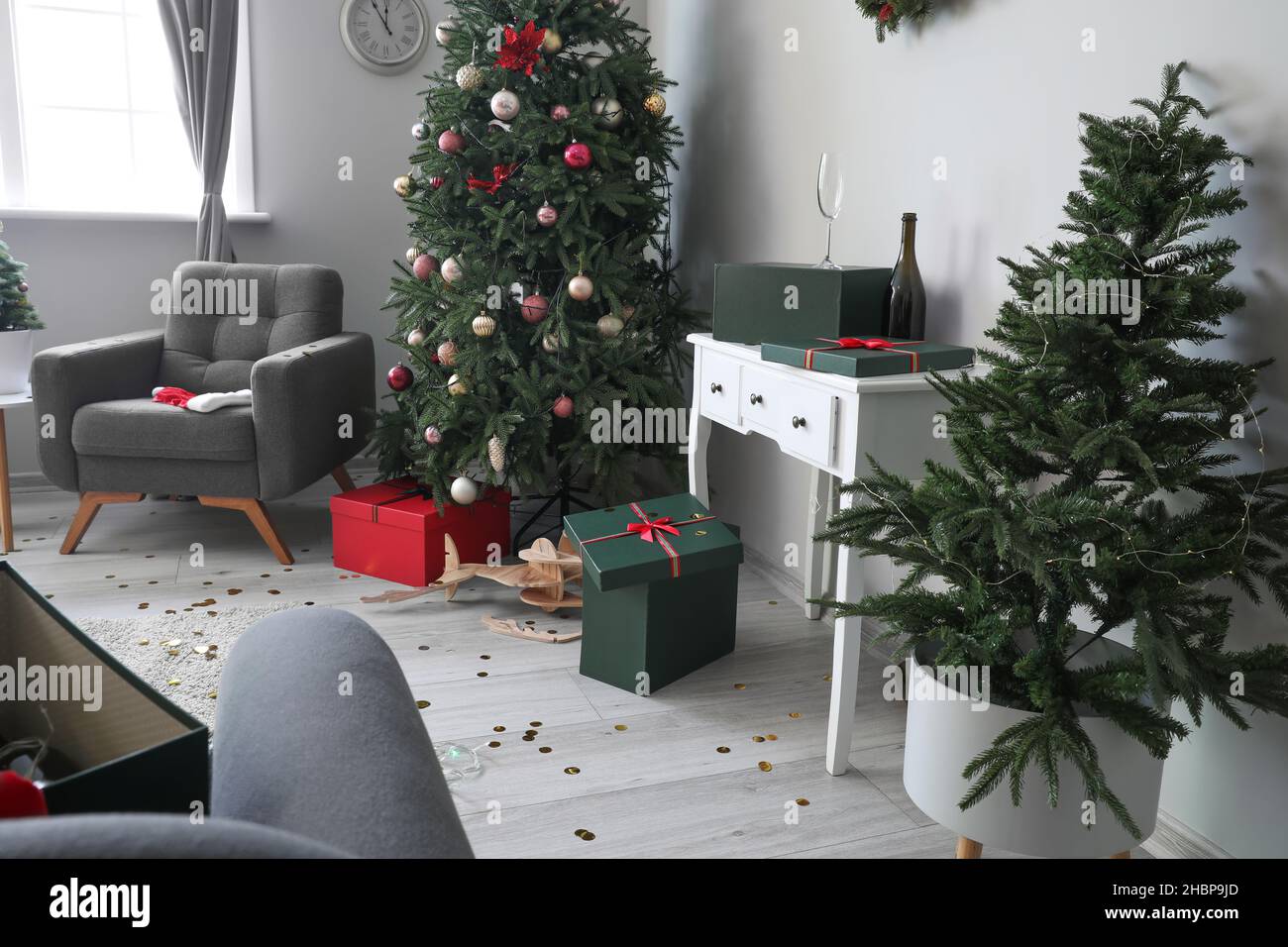 Interior of messy room after Christmas celebration Stock Photo