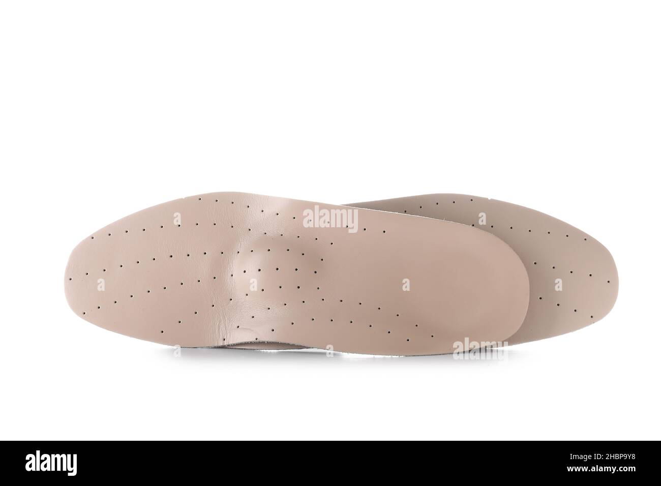 Beige orthopedic insoles on white background Stock Photo - Alamy