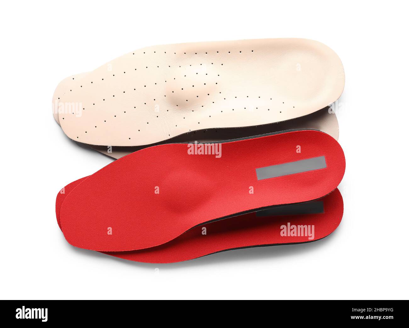 Different orthopedic insoles on white background Stock Photo Alamy