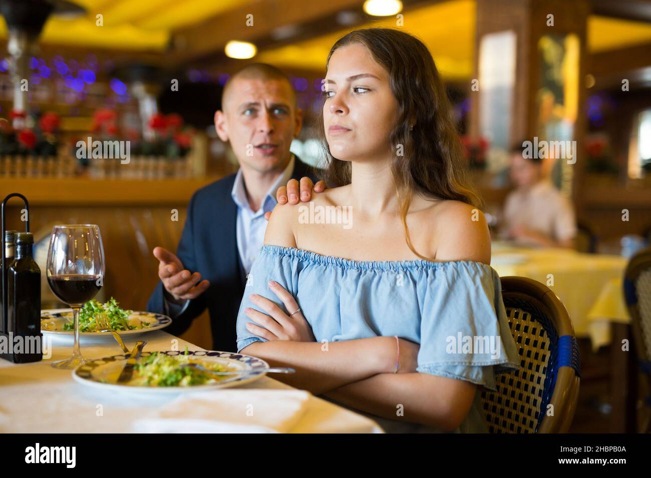 Man woman dinner table sad hi-res stock photography and images - Alamy
