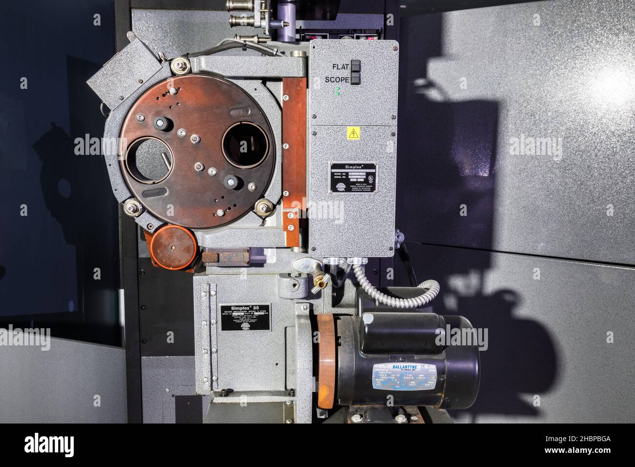 The front of an analogue movie projector laying on its side. Stock Photo