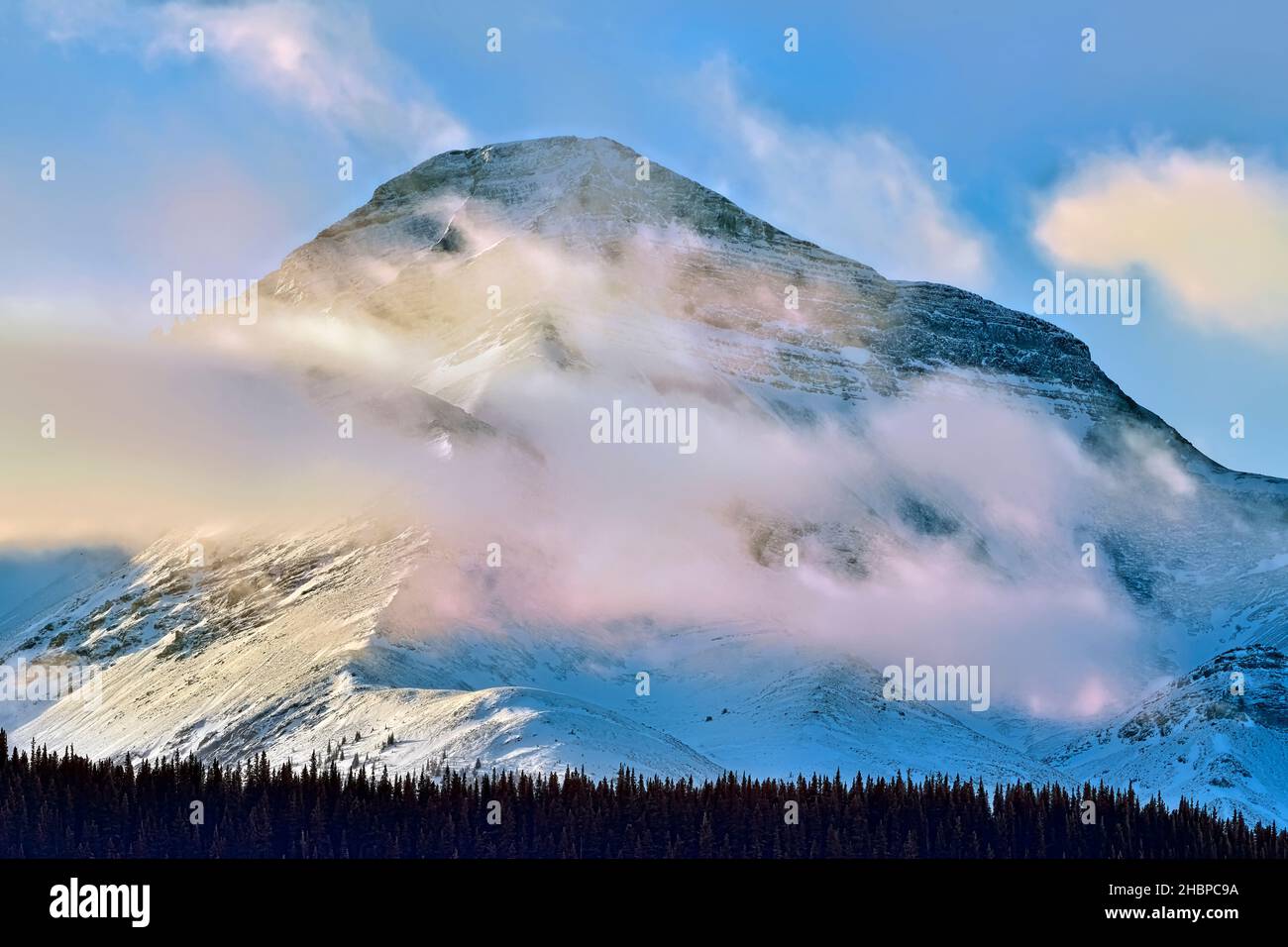 A close up image of a Rocky Mountain in rural Alberta Canada with a fresh winter snowfall. Stock Photo