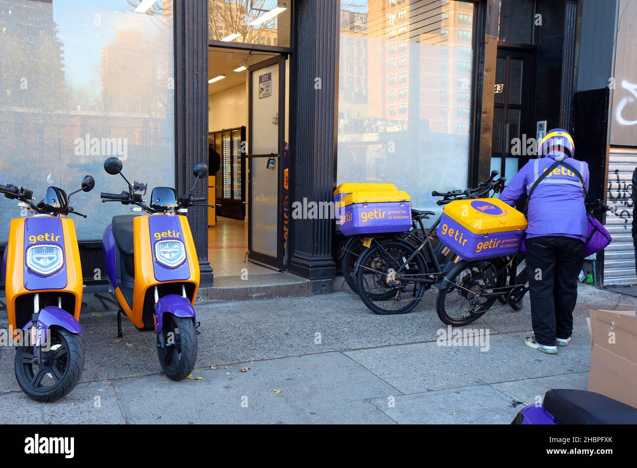 Istanbul-based Getir on-demand grocery delivery service at their micro-fulfillment center on Essex St in Manhattan, New York. quick commerce. Stock Photo