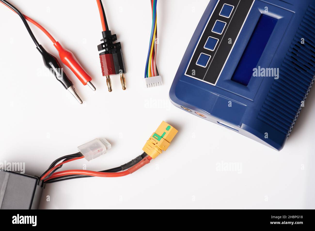 Professional battery charger with wires and charger isolated Stock Photo