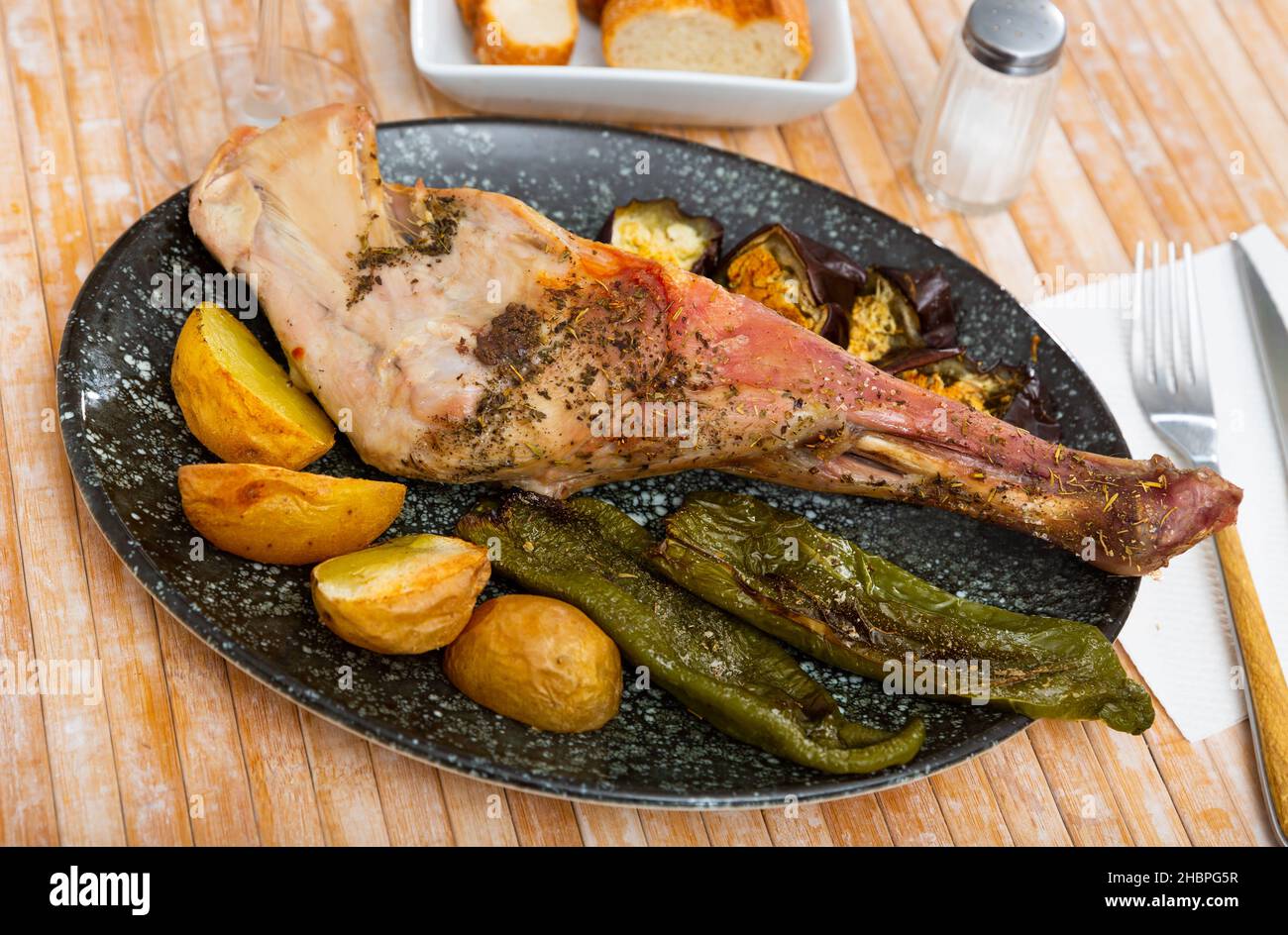 Roasted lamb shoulder with vegetables Stock Photo Alamy