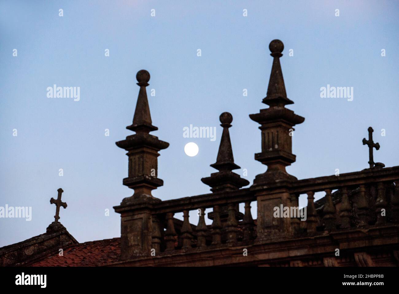 Moon and back side of Cathedral of Santiago de Compostela at Praza do Obradoiro Santiago de Compostela A Coruña, Spain. Stock Photo