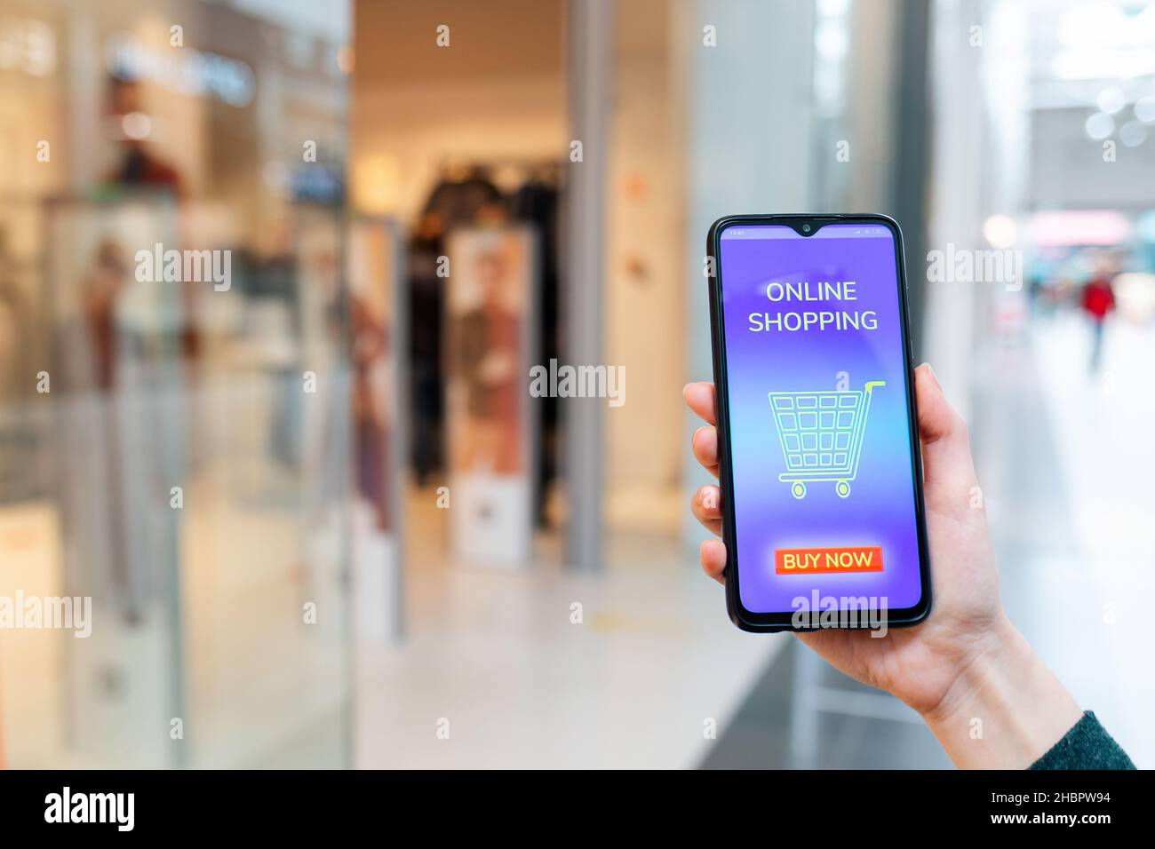A female's hand shows a cellphone with a promo code for a discount at an online  store. Blurred background. The concept of internet shopping Stock Photo -  Alamy