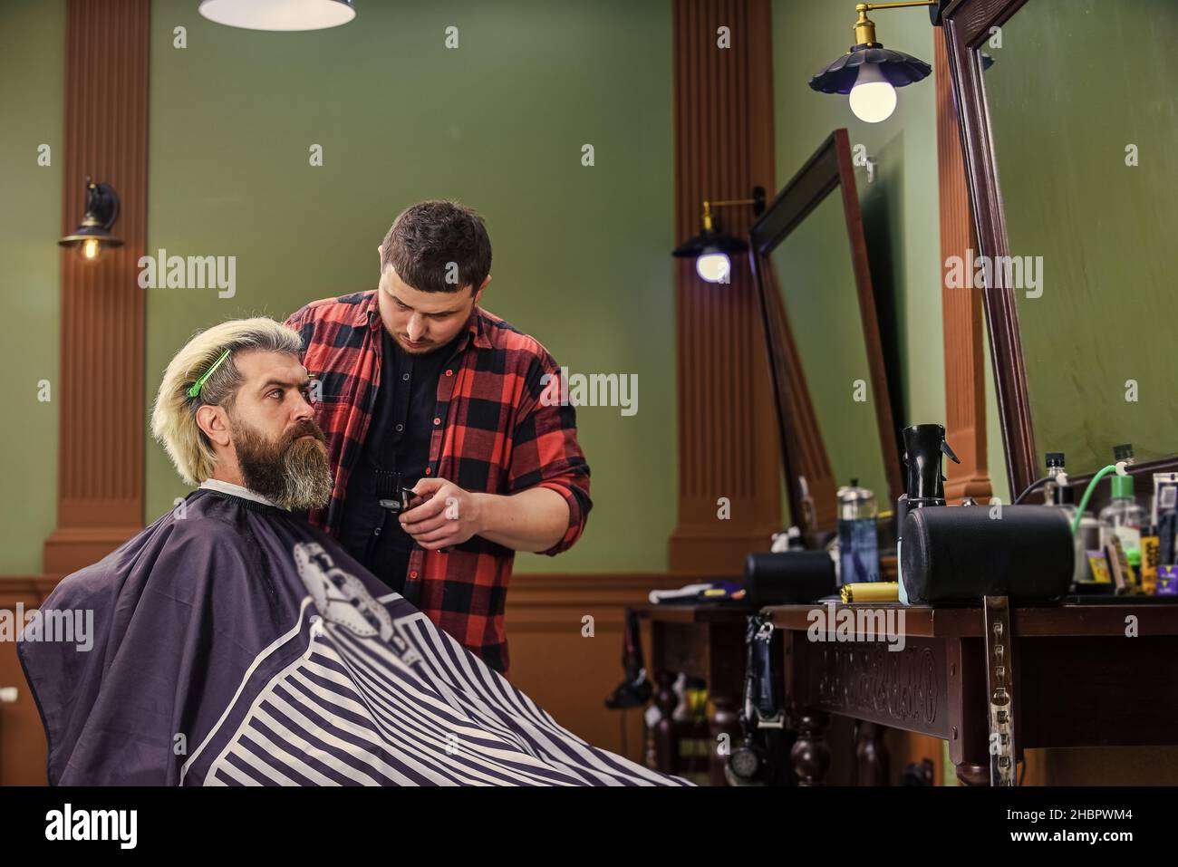 Make it possible with us. dye hair and give new shape. male hairdresser  salon. barber professional master. making new hairstyle. man get haircut  Stock Photo - Alamy